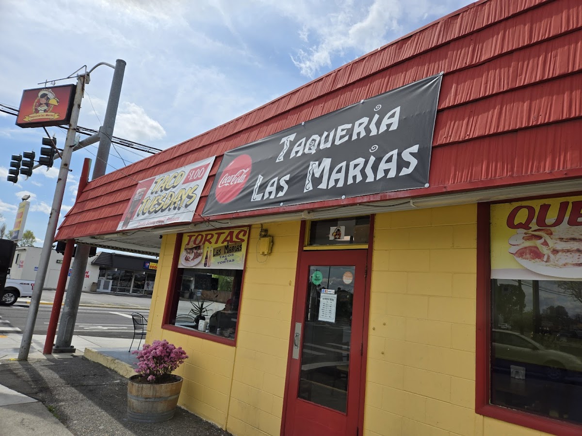 The red and yellow corner storefront of Taqueria Las Maria's in Pasco